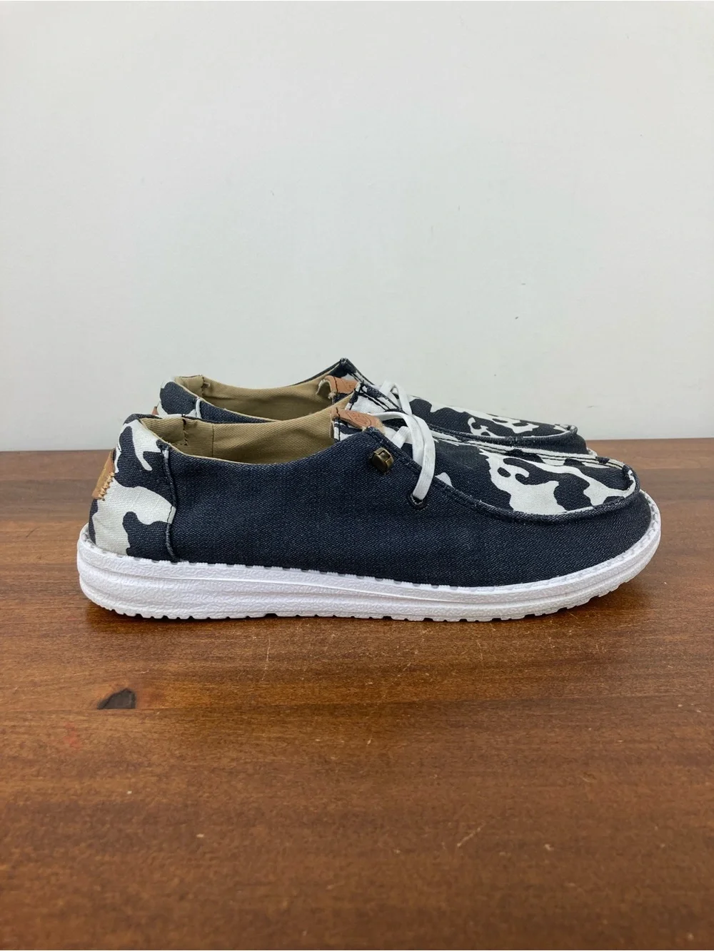 Hey Dude Wendy Animal Black Cow Print Slip-On Shoes 41037-0HO Women's Size 6.